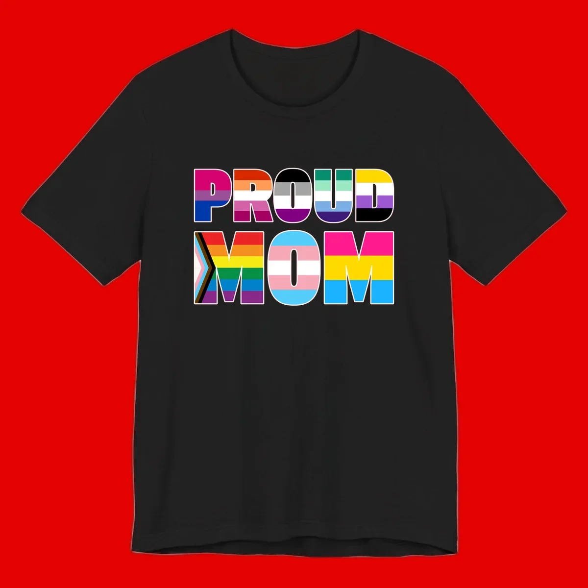 Colorful 'PROUD' letters filled with various pride flags including rainbow, trans, progress pride, and intersex symbols on gray background