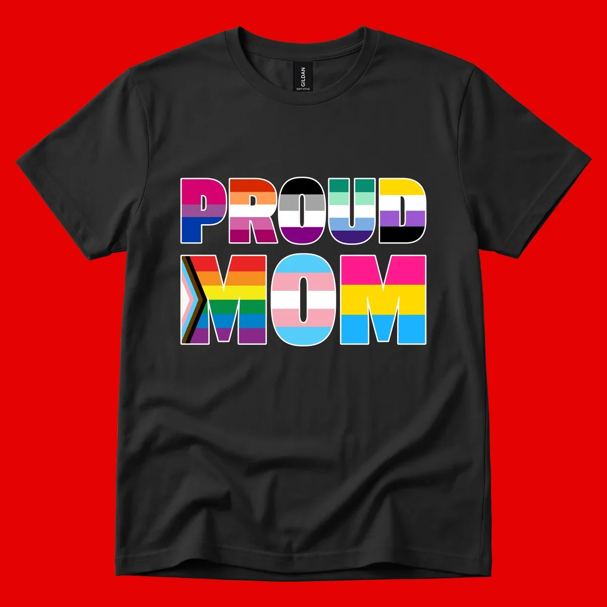 Colorful 'PROUD' letters filled with various pride flags including rainbow, trans, progress pride, and intersex symbols on gray background