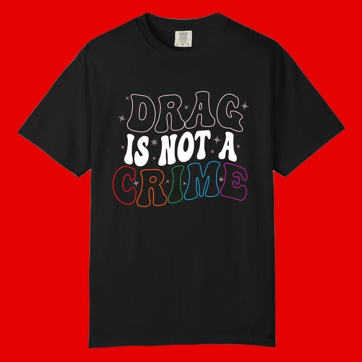 Drag is not a crime design with white and rainbow-colored outlined text on gray background
