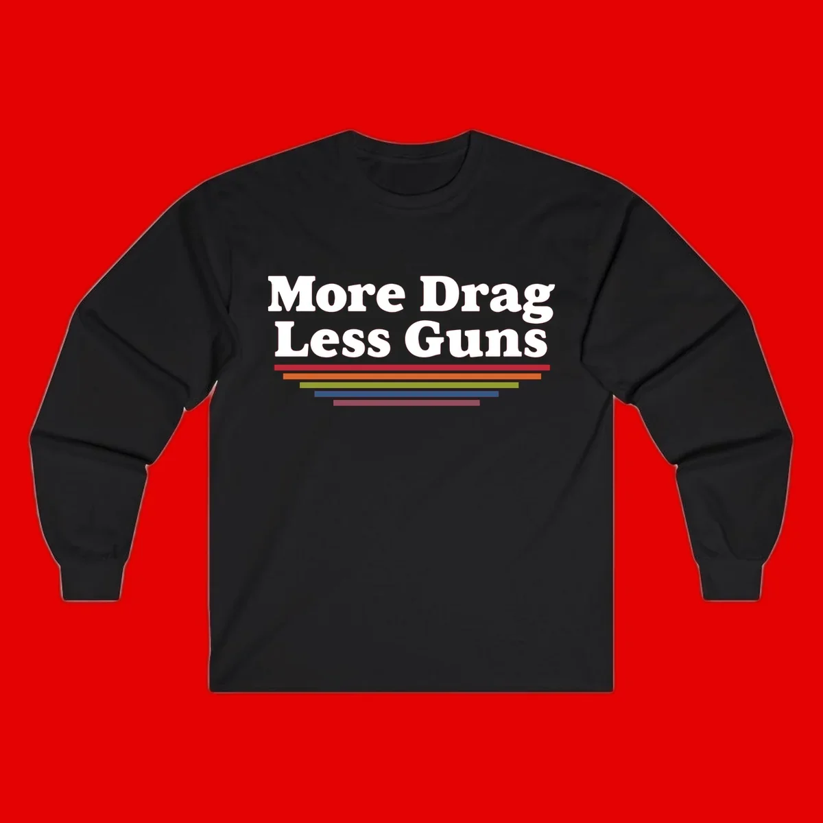 More Drag Less Guns design: white text on gray background with colored horizontal bars representing pride and activism