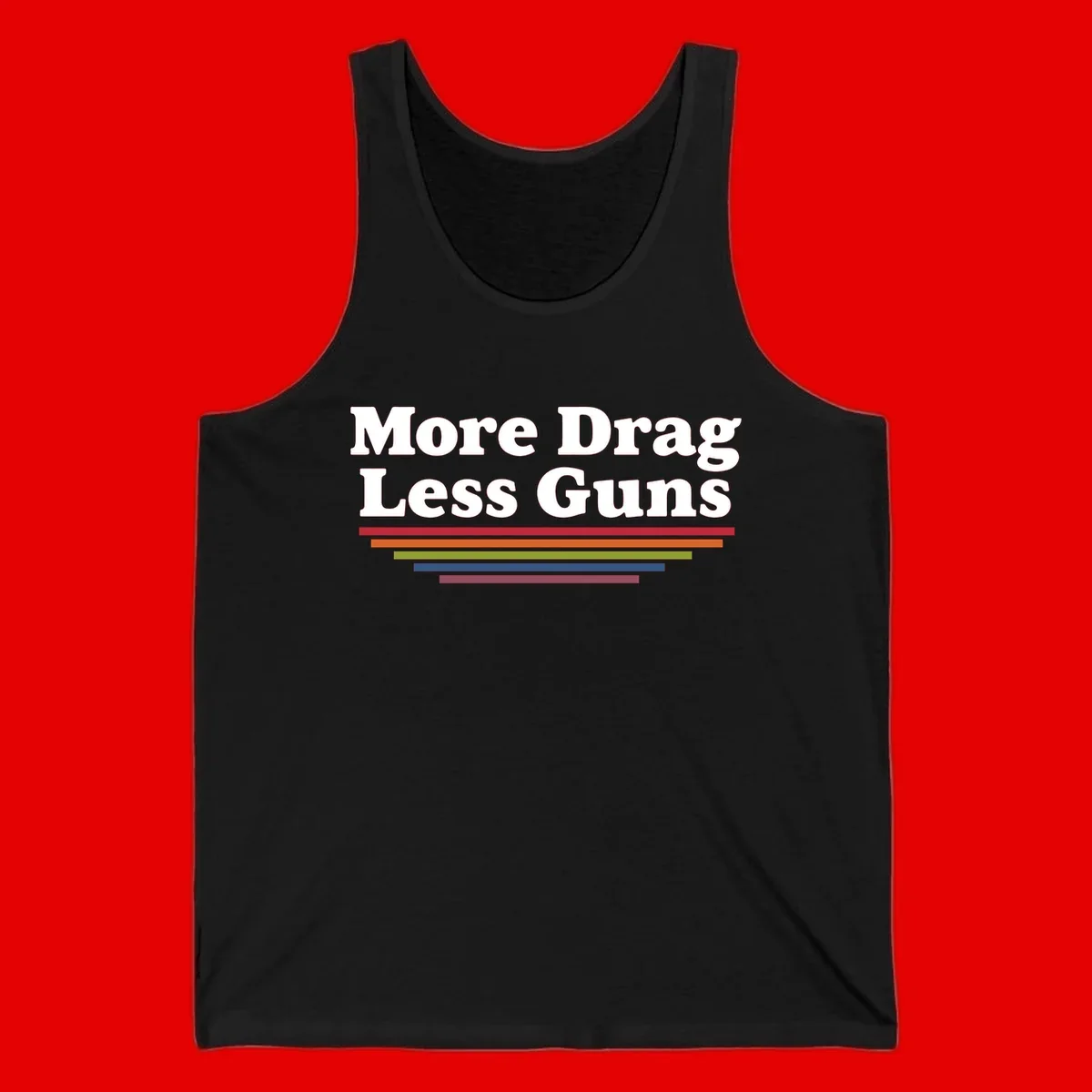 More Drag Less Guns design: white text on gray background with colored horizontal bars representing pride and activism