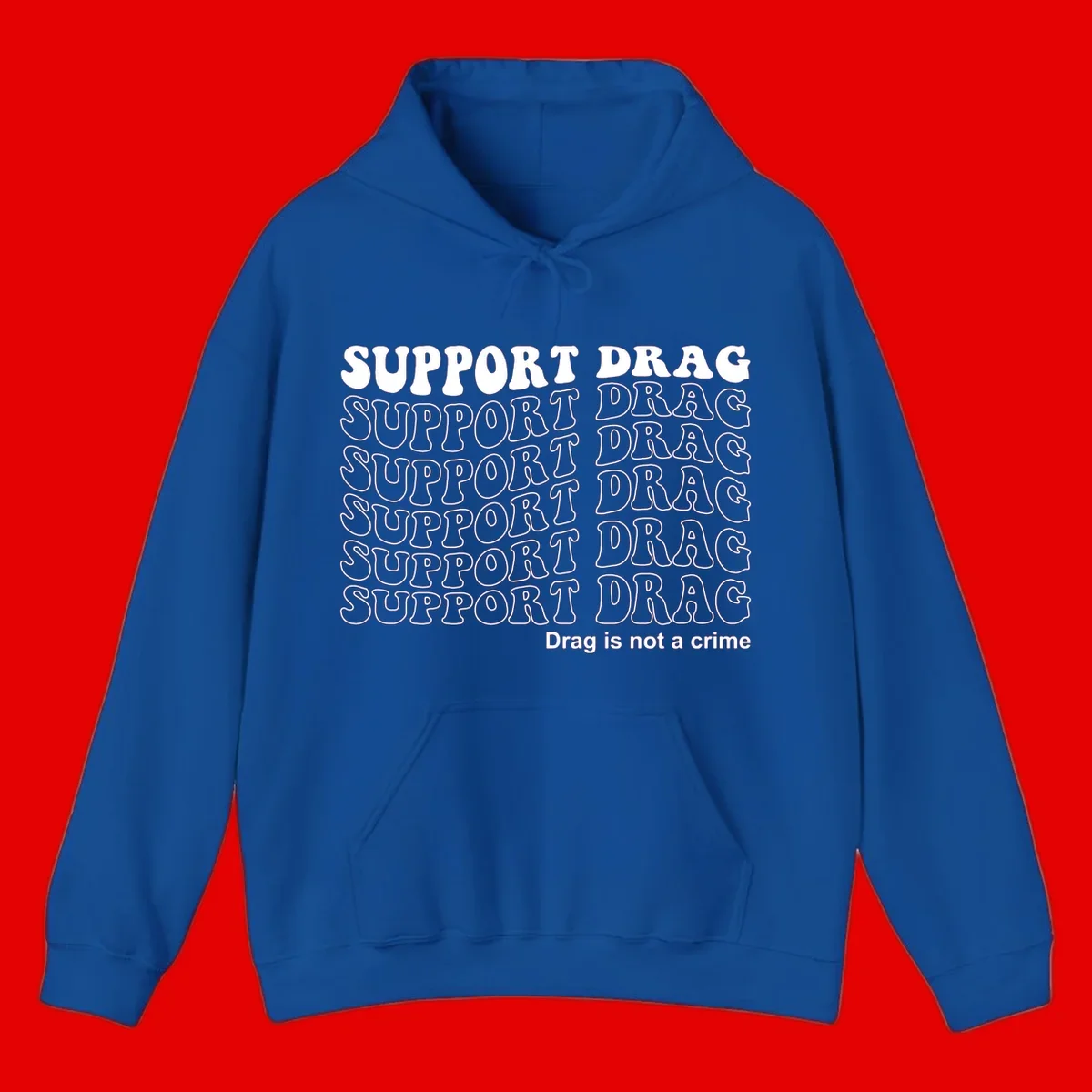 Gray t-shirt design with white text reading 'Support Drag' repeated throughout and 'Drag is not a crime' at bottom