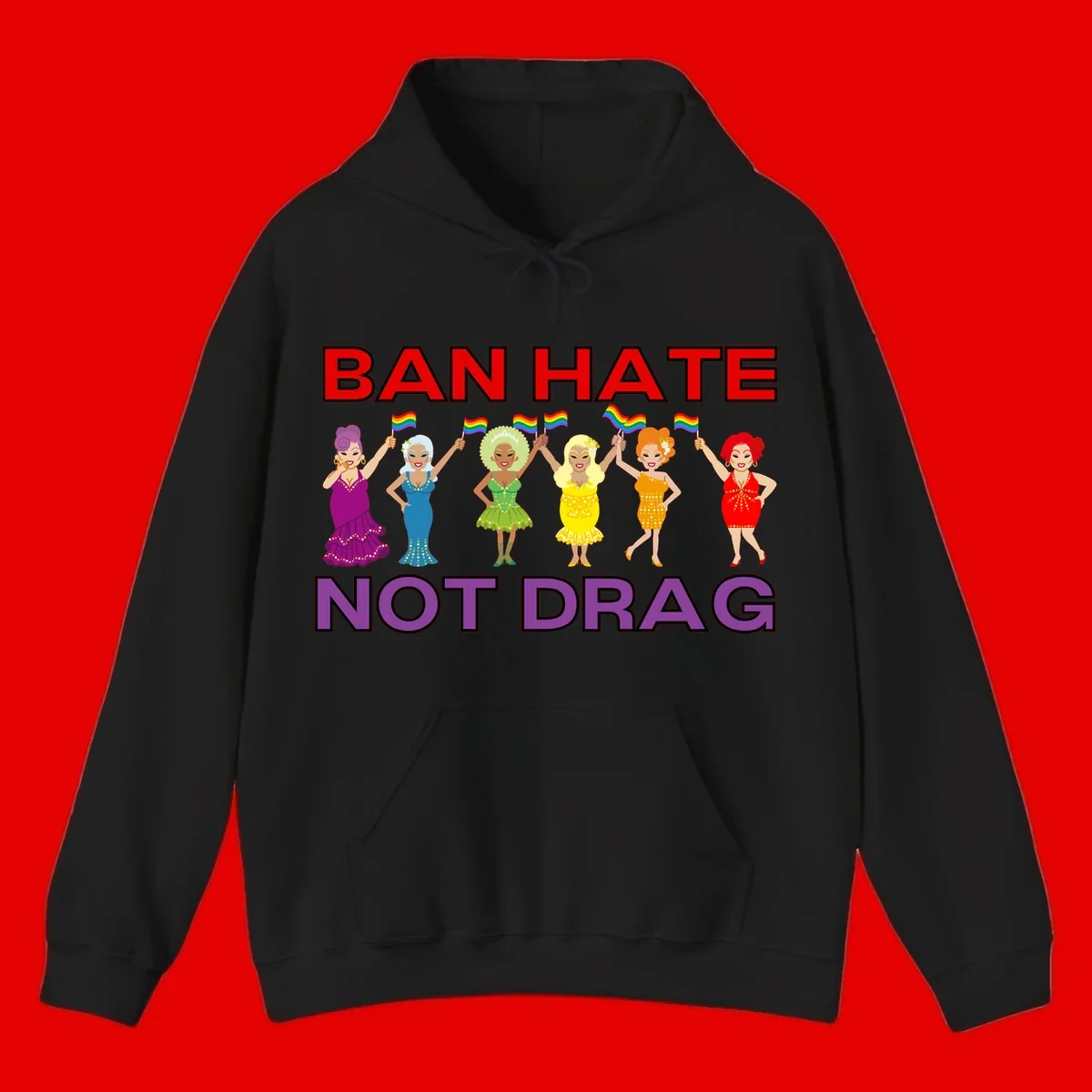 Six drag queens in colorful sequined dresses holding rainbow pride flags with text 'Ban Hate Not Drag' celebrating LGBTQ pride and drag culture