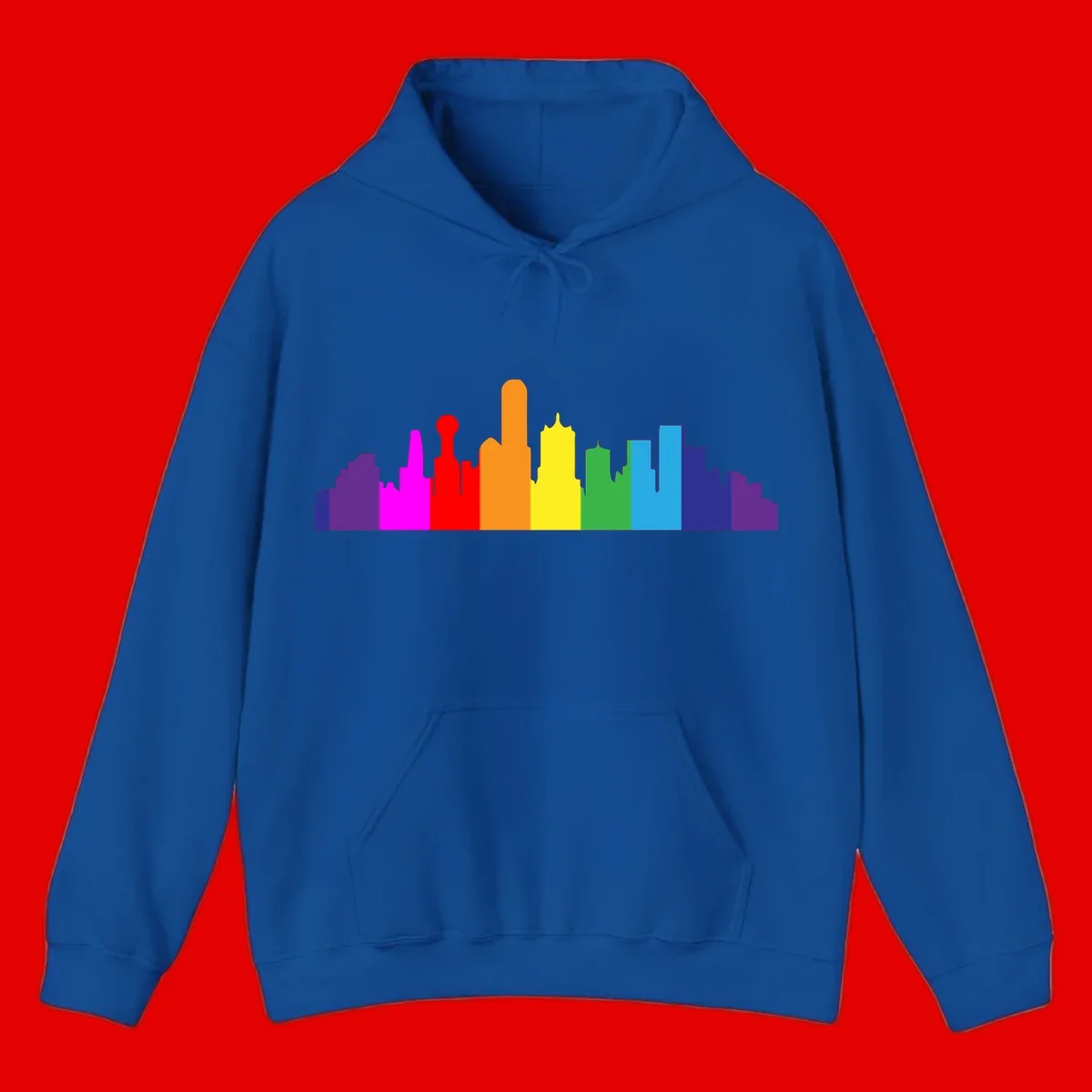 Colorful city skyline silhouette in rainbow pride colors transitioning from purple through red, orange, yellow, green, cyan and blue