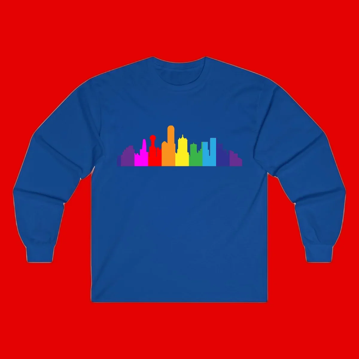 Colorful city skyline silhouette in rainbow pride colors transitioning from purple through red, orange, yellow, green, cyan and blue
