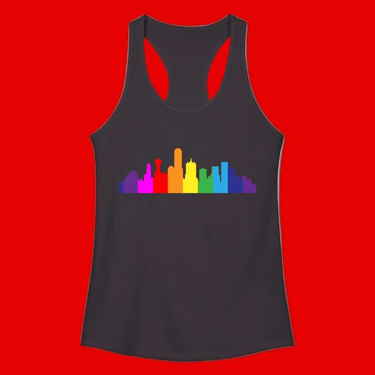 Colorful city skyline silhouette in rainbow pride colors transitioning from purple through red, orange, yellow, green, cyan and blue