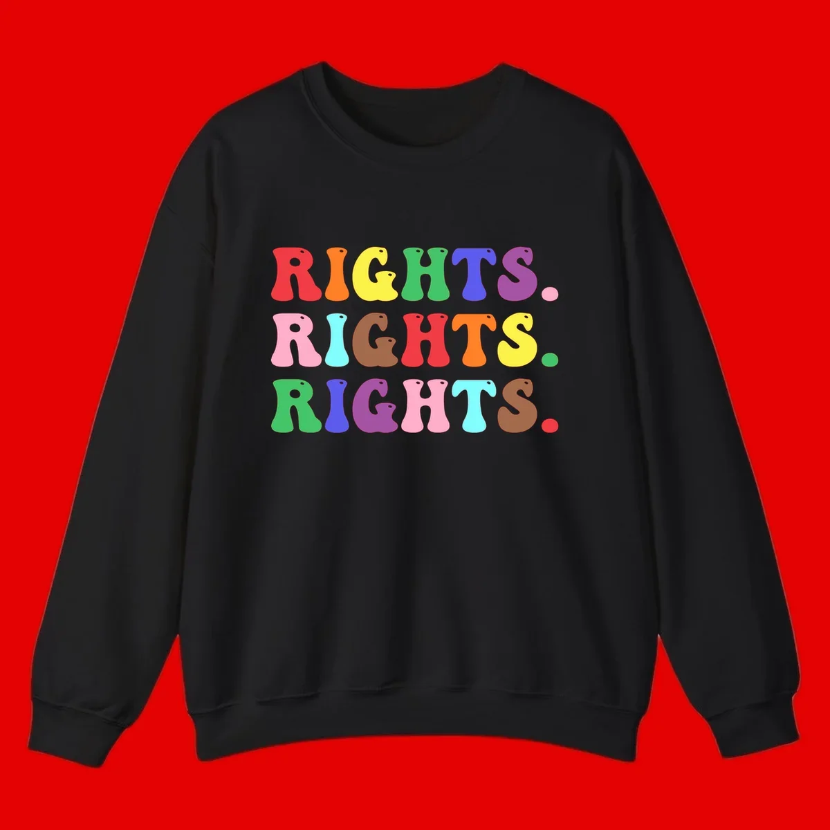 The word 'RIGHTS' repeated three times in large rainbow-colored letters with playful organic shapes and small dots, celebrating pride and equality.