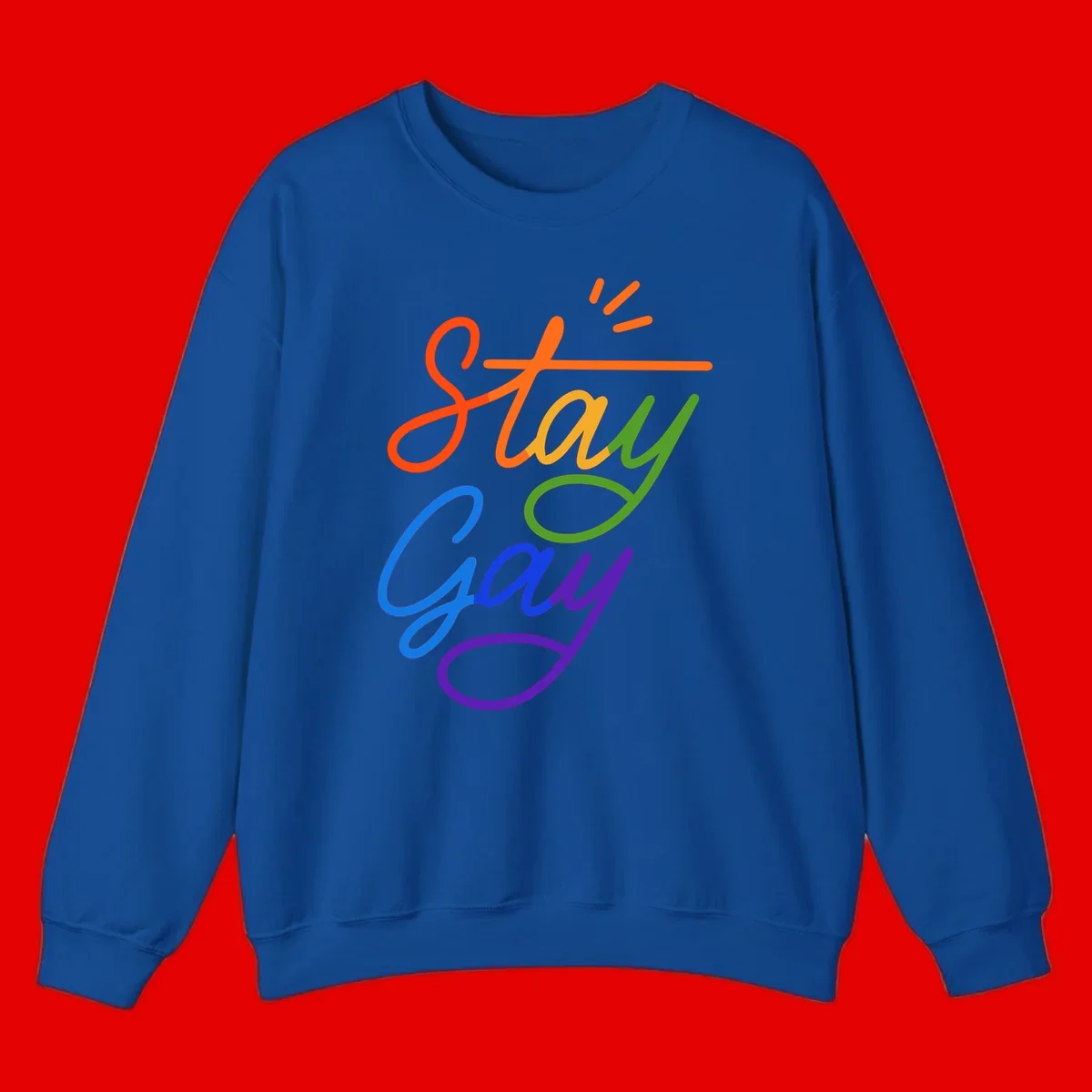 Rainbow gradient text reading 'Stay Gay' with a green checkmark and sparkle accents on gray background