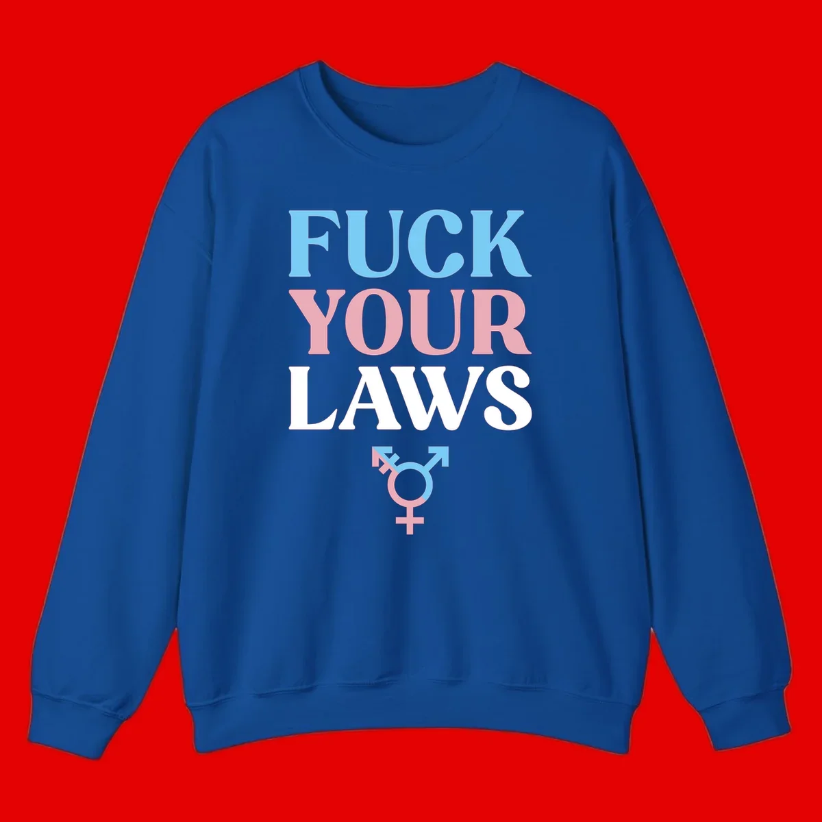 Bold typography design reading 'FUCK YOUR LAWS' in blue, pink, and white text with a split-color transgender symbol below