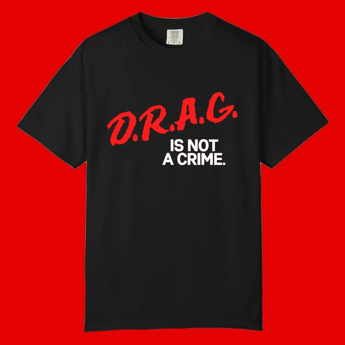 Bold red LGBTQ+ letters with white text reading 'IS NOT A CRIME' on gray background, pride statement design.