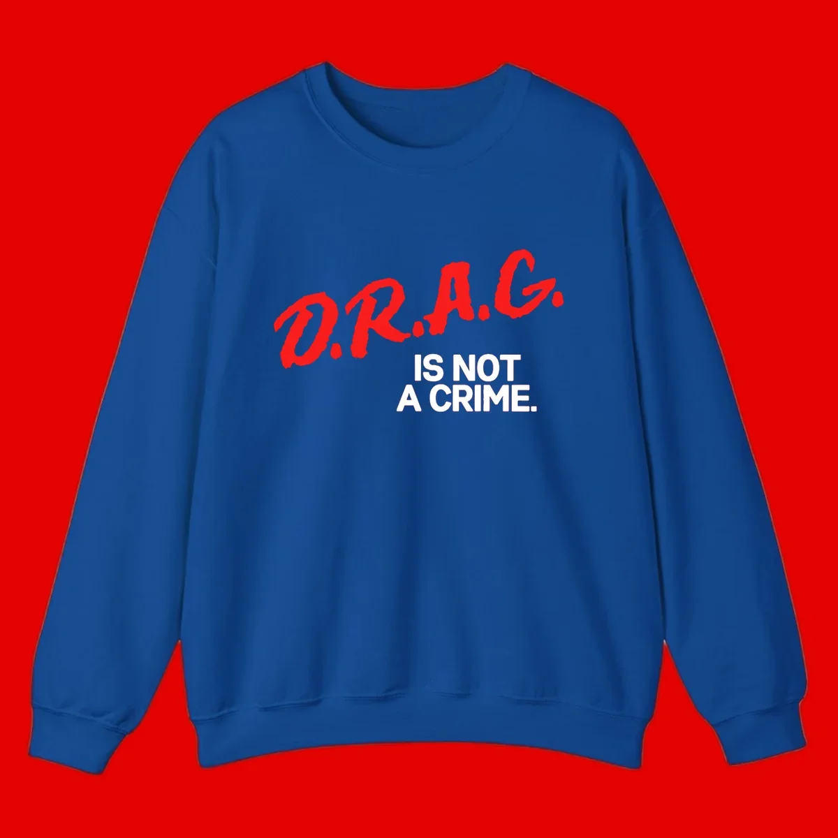 Bold red LGBTQ+ letters with white text reading 'IS NOT A CRIME' on gray background, pride statement design.
