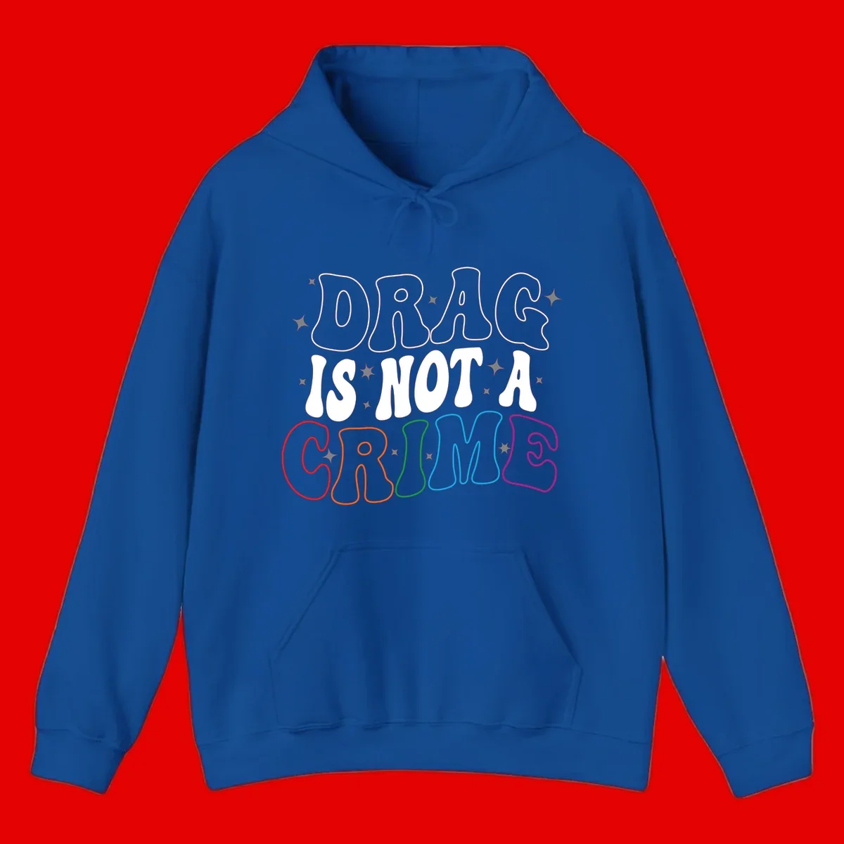 Drug is not a crime design with rainbow pride colored letters on gray background, promoting social justice and harm reduction advocacy