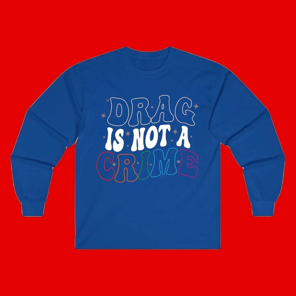 Drug is not a crime design with rainbow pride colored letters on gray background, promoting social justice and harm reduction advocacy