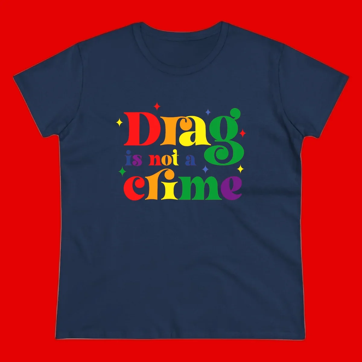 Rainbow gradient text reading 'Drag is not a crime' with colorful stars on gray background