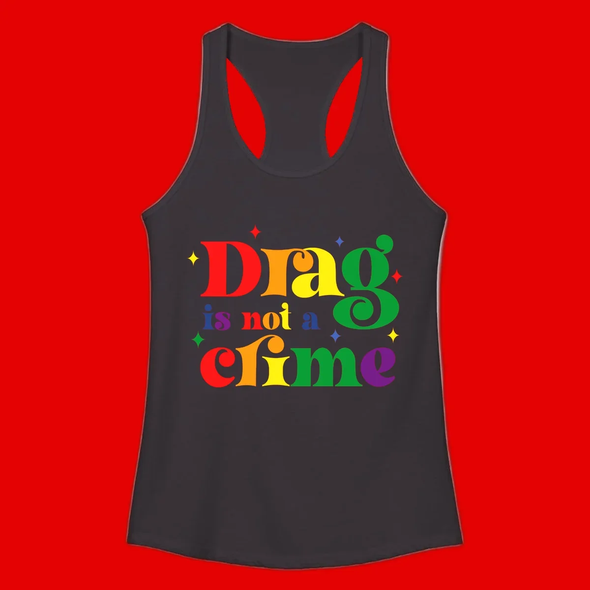 Rainbow gradient text reading 'Drag is not a crime' with colorful stars on gray background