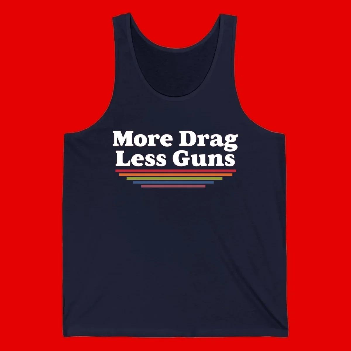 Bold white text reading 'More Drag Less Guns' with colorful horizontal bars below on gray background