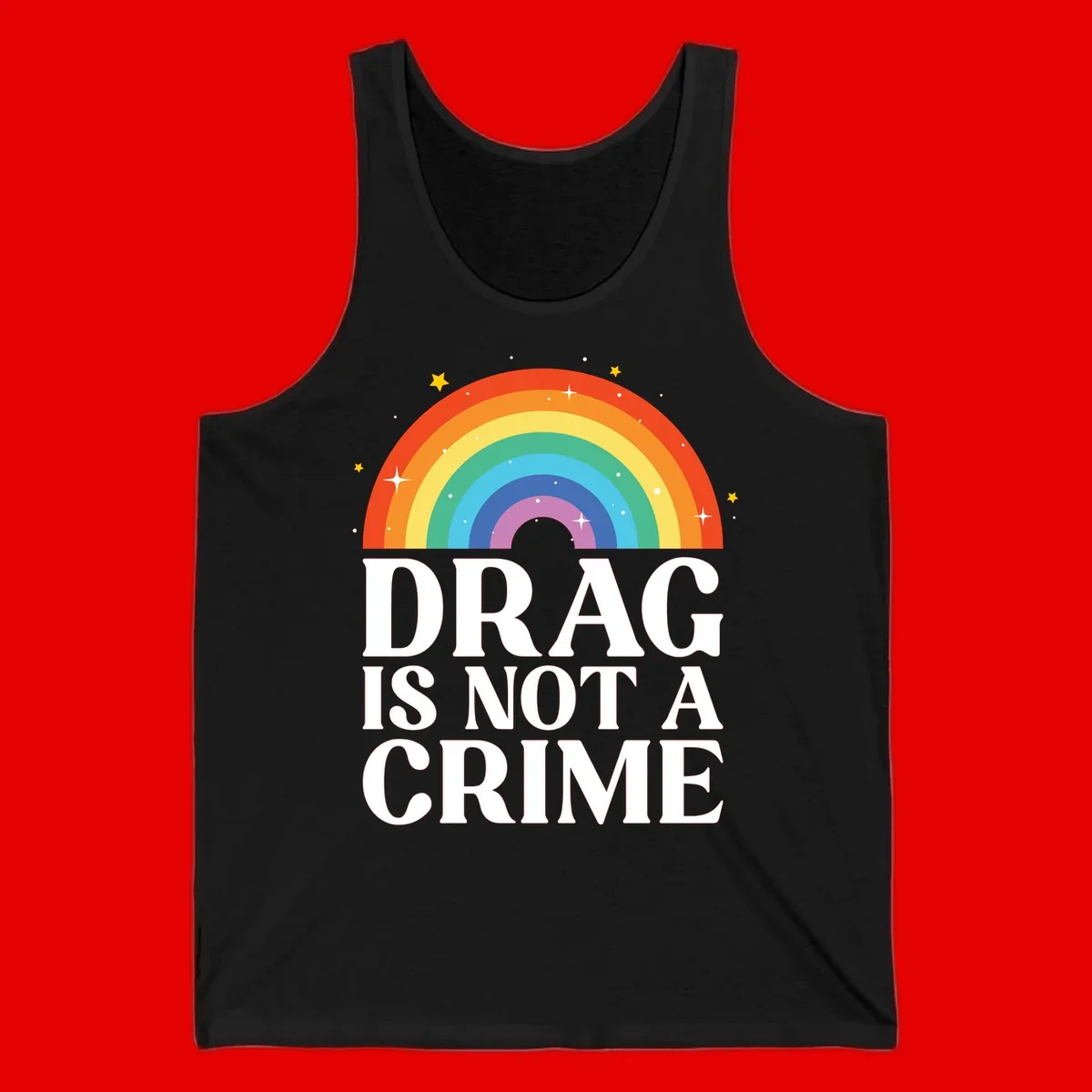 Rainbow arc with stars and text reading 'Drag Is Not A Crime' - a pride-themed design celebrating drag rights and LGBTQ+ equality
