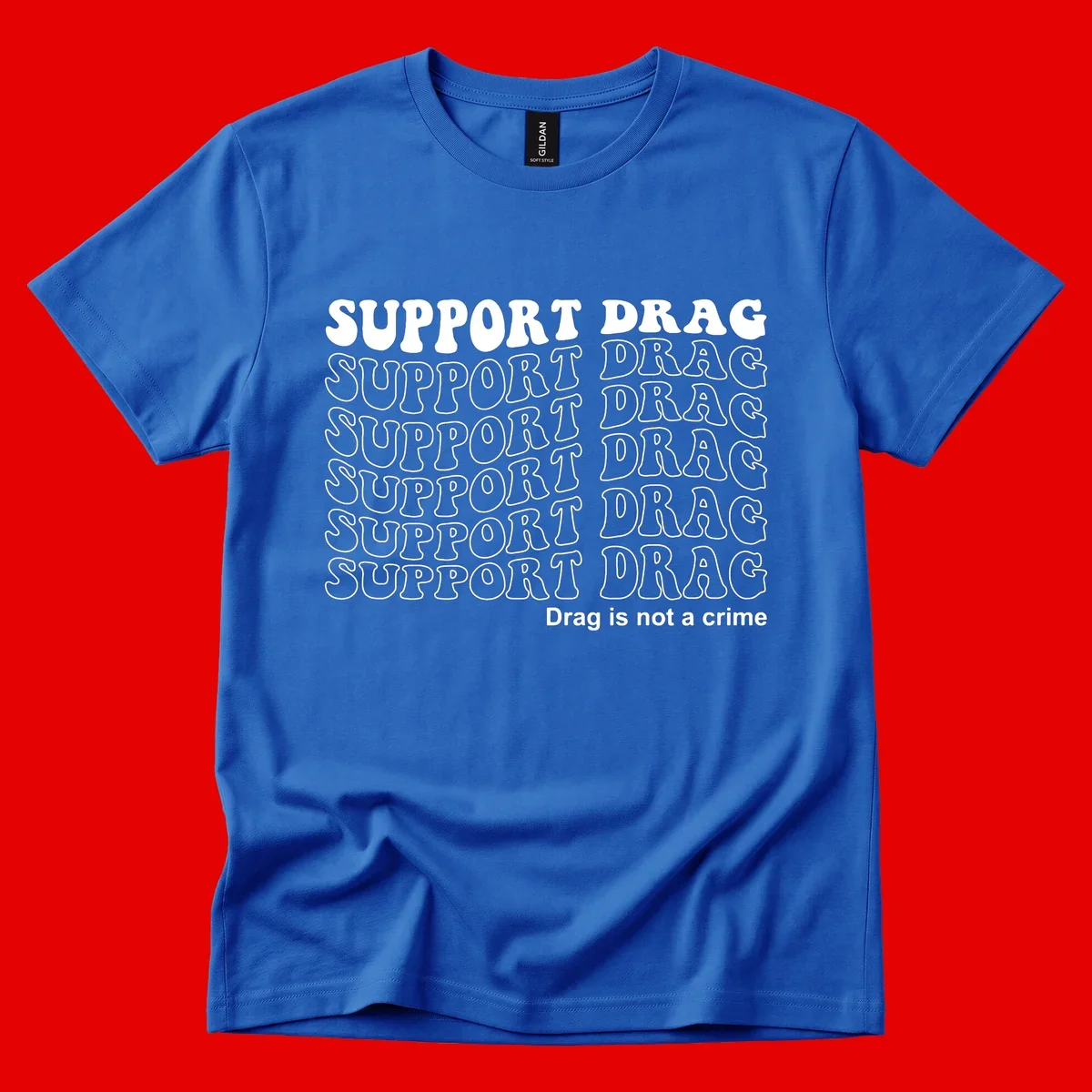Gray shirt design with white text reading 'Support Drag' repeated vertically and 'Drag is not a crime' at bottom