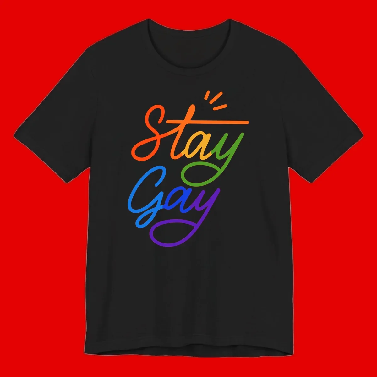Colorful rainbow text reading 'Stay Gay' with green checkmark and orange exclamation marks, celebrating LGBTQ+ pride