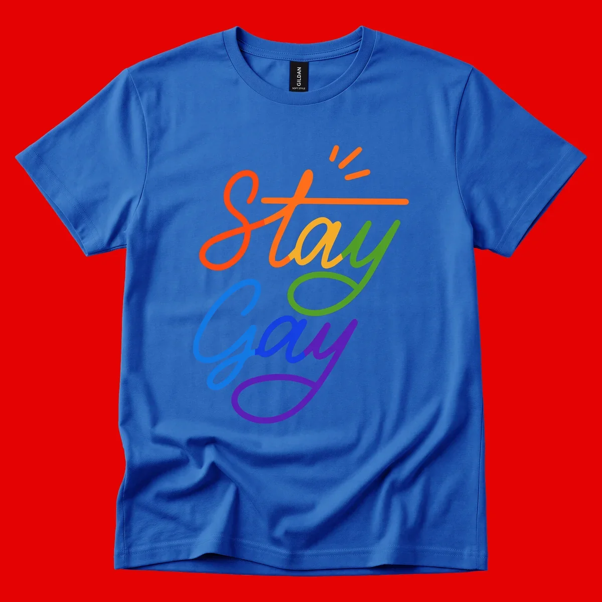 Colorful rainbow text reading 'Stay Gay' with green checkmark and orange exclamation marks, celebrating LGBTQ+ pride