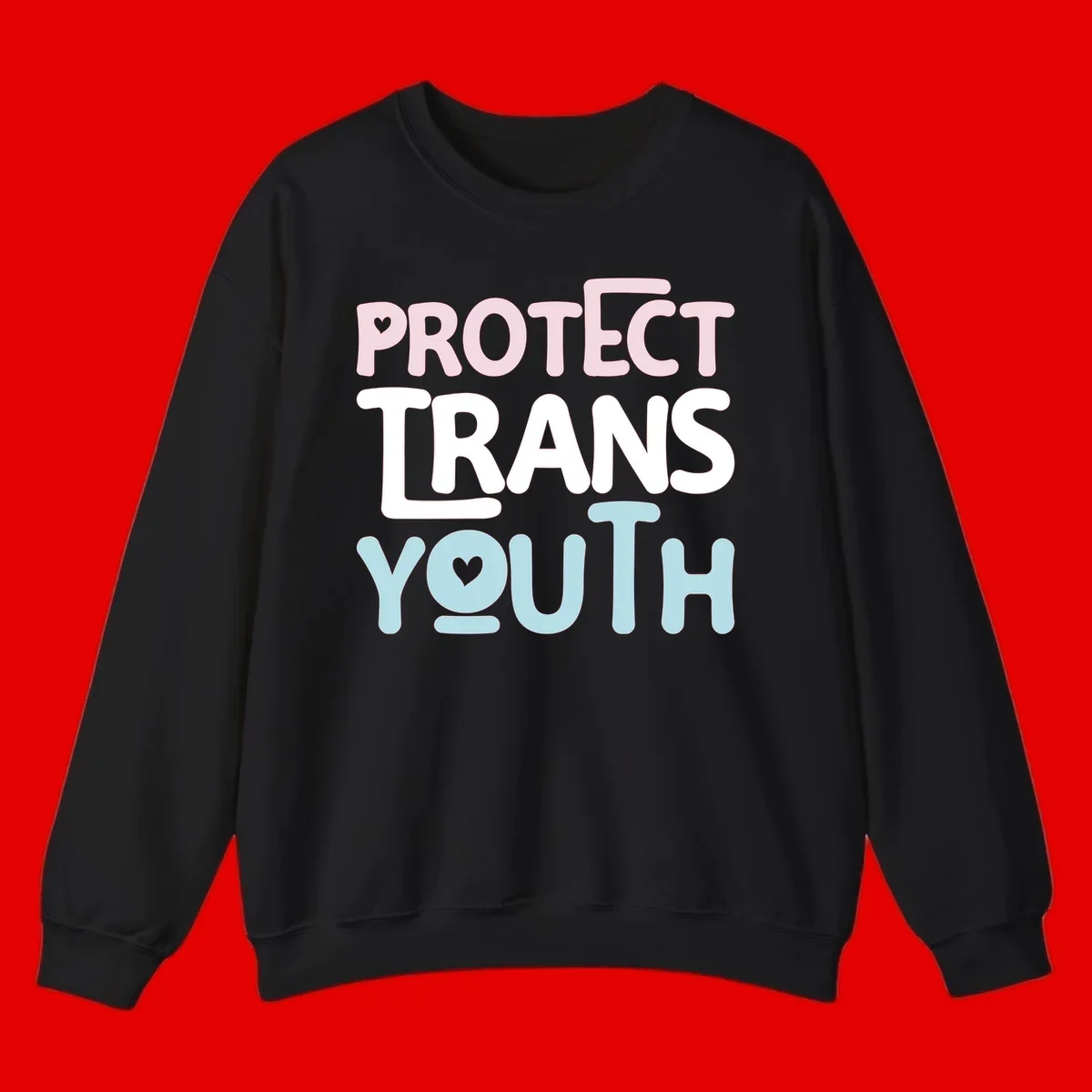 Protect trans youth design with pink, white, and blue bold lettering and heart symbols