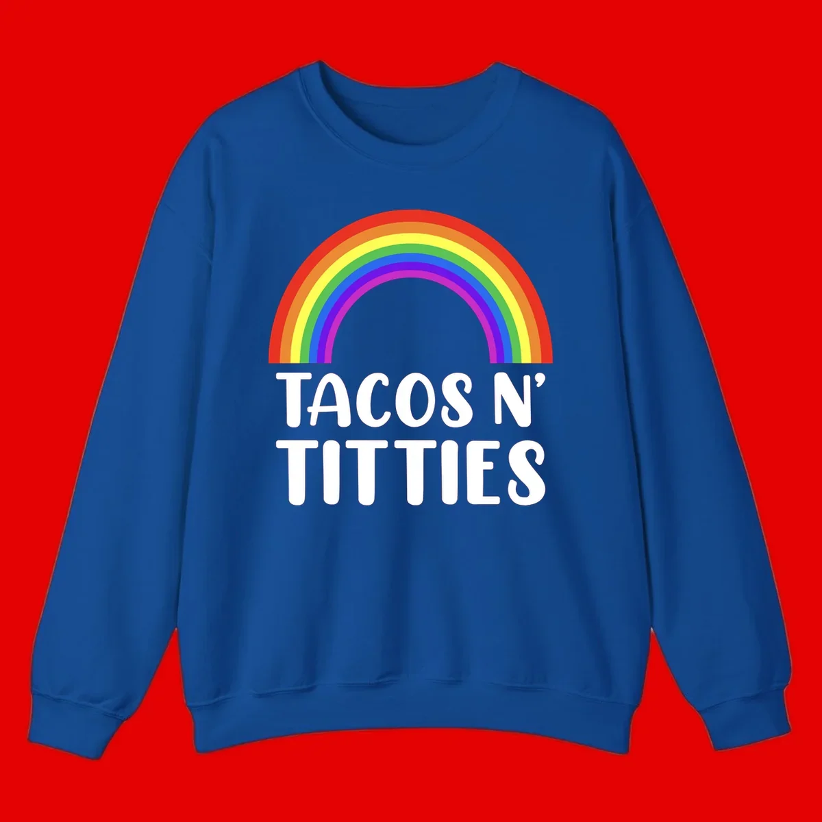 Colorful rainbow arc above white text reading 'TACOS N' TACOS' on gray background, celebrating Pride with playful design