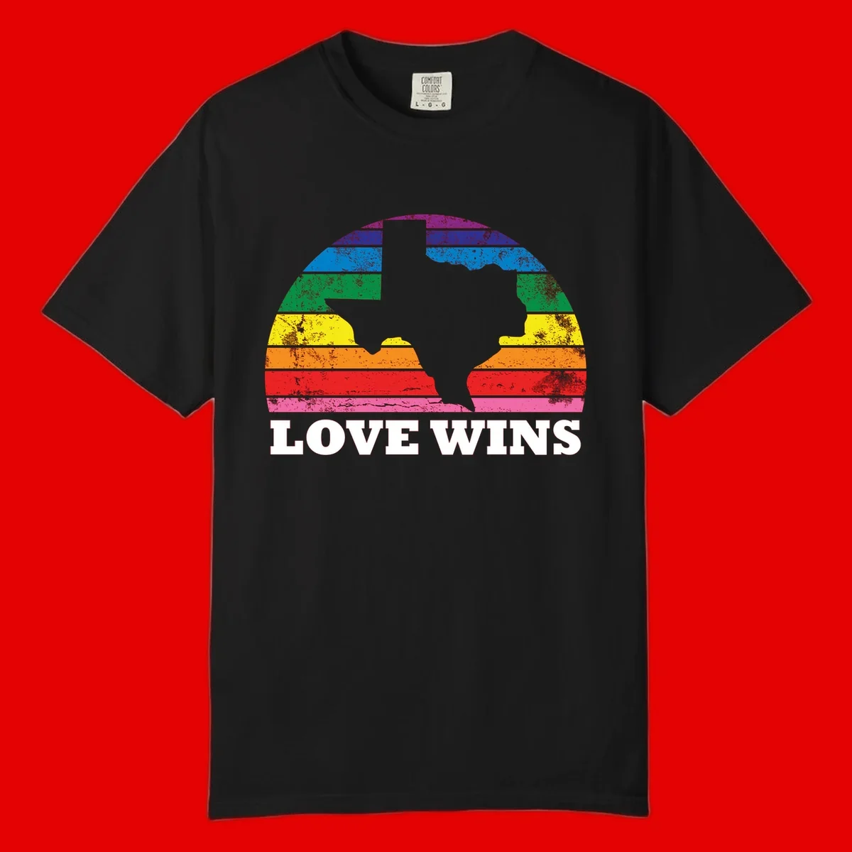 Two human head silhouettes in profile filled with rainbow horizontal stripes, with 'Love Wins' text below