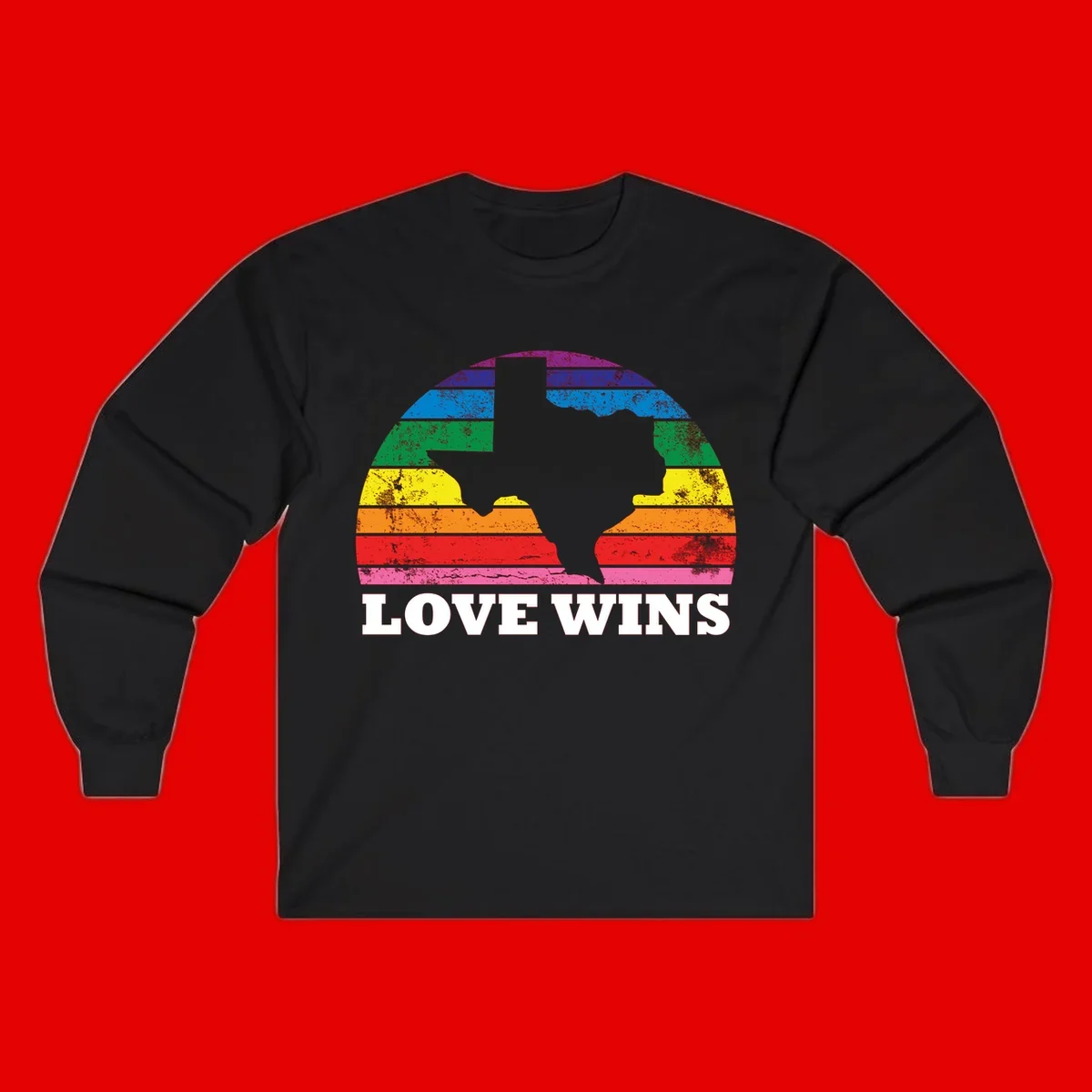 Two human head silhouettes in profile filled with rainbow horizontal stripes, with 'Love Wins' text below