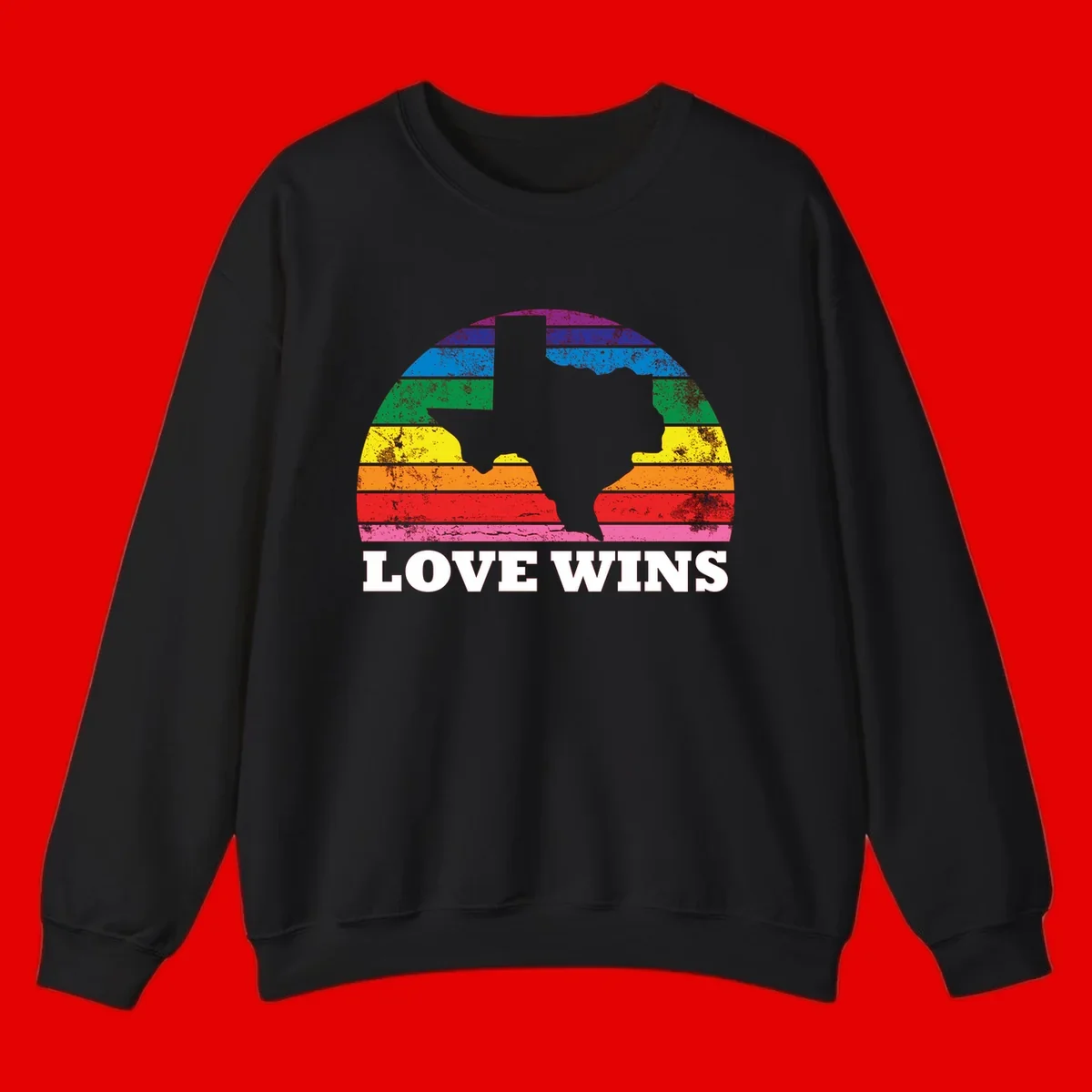 Two human head silhouettes in profile filled with rainbow horizontal stripes, with 'Love Wins' text below