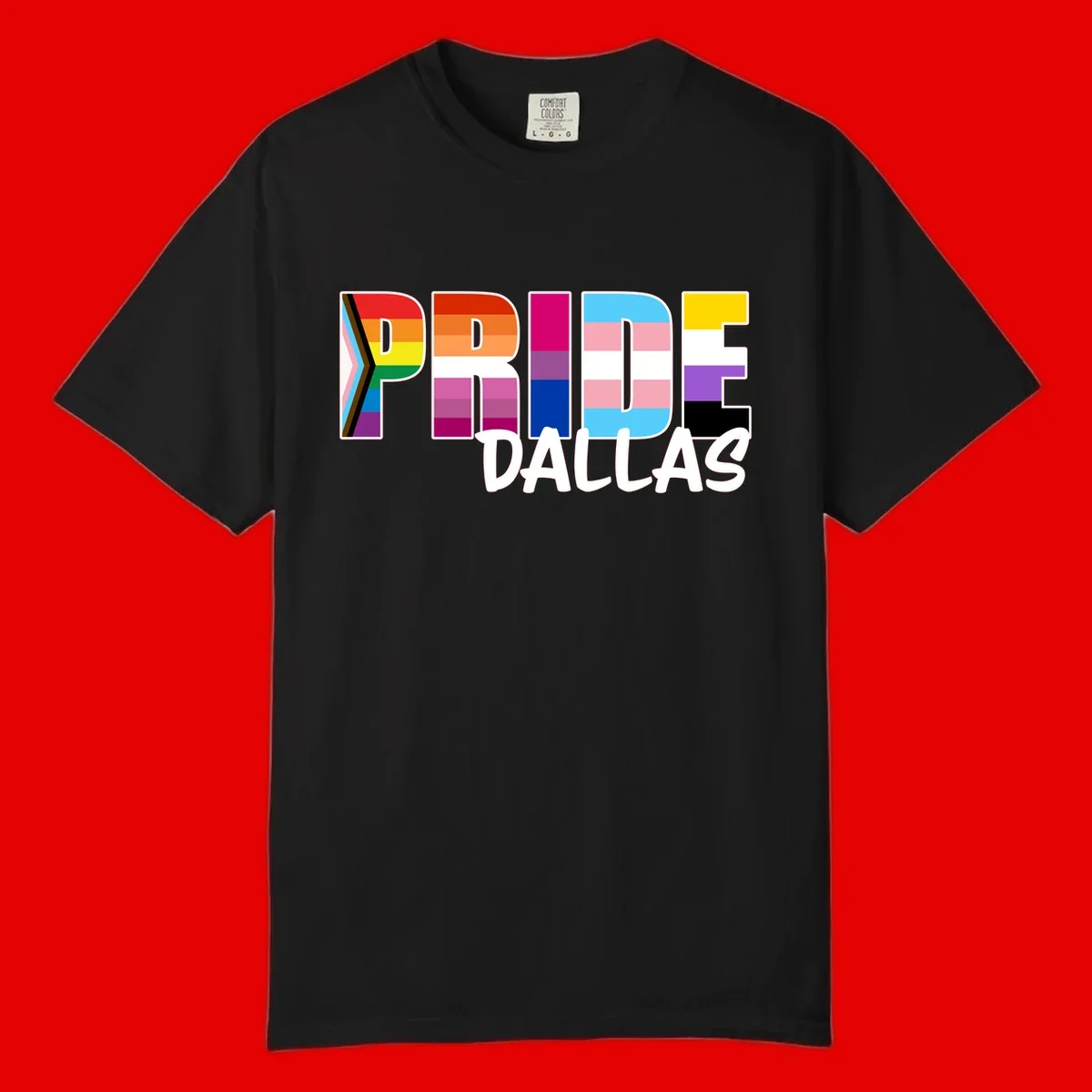 Pride Dallas design with large colorful block letters filled with rainbow and pride flag colors including progress chevron stripes