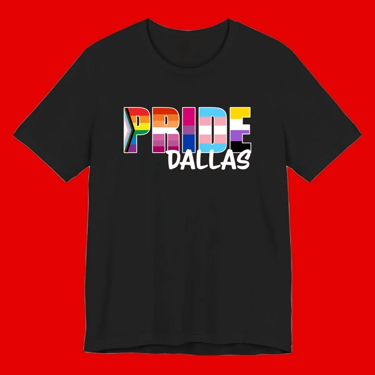 Pride Dallas design with large colorful block letters filled with rainbow and pride flag colors including progress chevron stripes