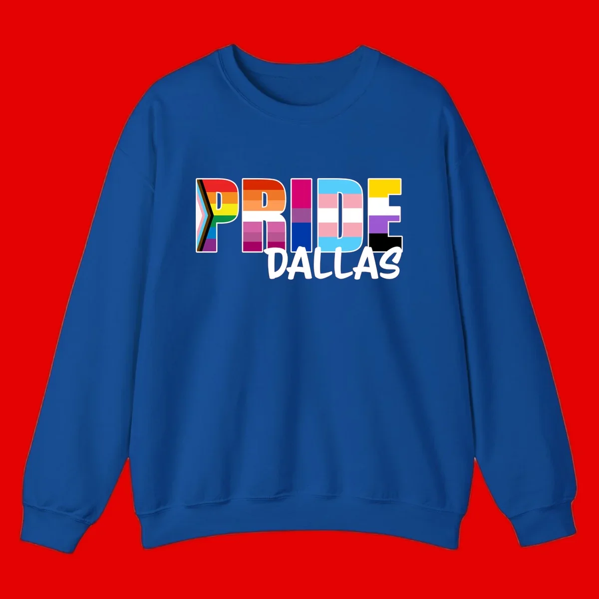 Pride Dallas design with large colorful block letters filled with rainbow and pride flag colors including progress chevron stripes