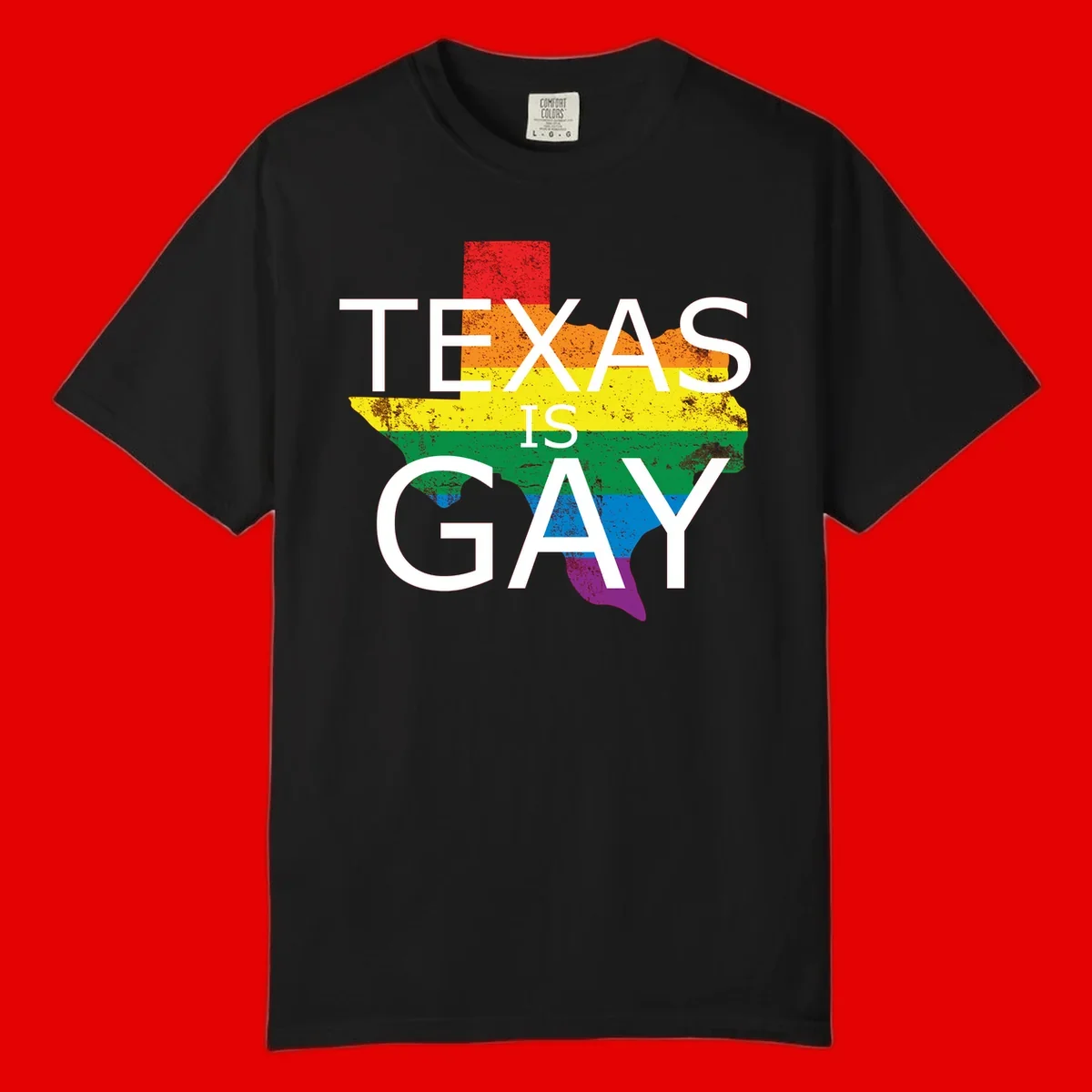 Texas state map filled with rainbow pride flag colors and white text reading 'Texas Is A Gay'