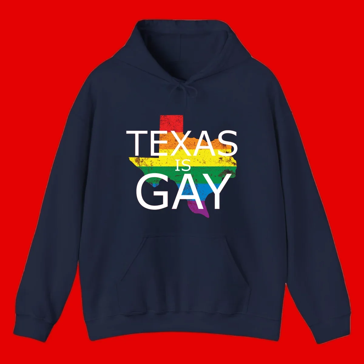 Texas state map filled with rainbow pride flag colors and white text reading 'Texas Is A Gay'