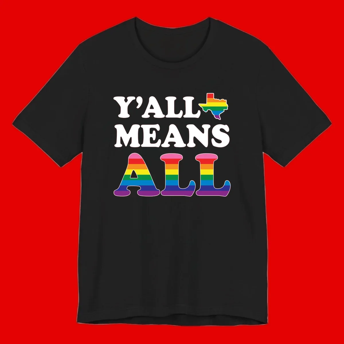 Y'ALL MEANS ALL design with rainbow pride flag colors on Texas map and letter shapes, celebrating LGBTQ+ inclusion