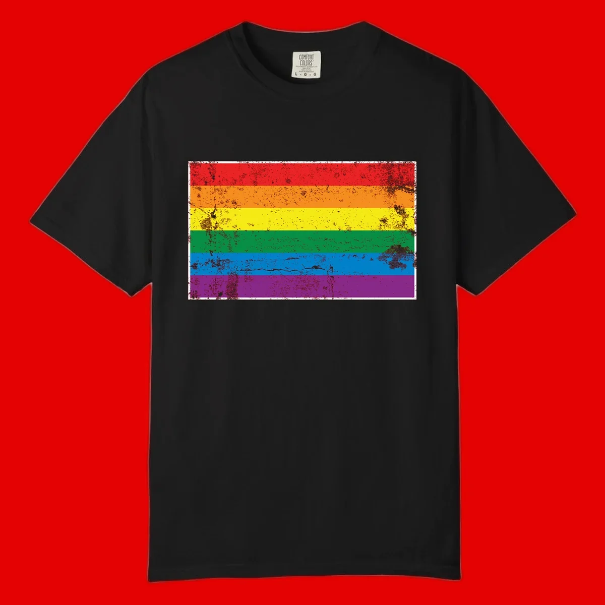 Distressed rainbow pride flag with six horizontal color stripes: red, orange, yellow, green, blue, and purple with grunge texture