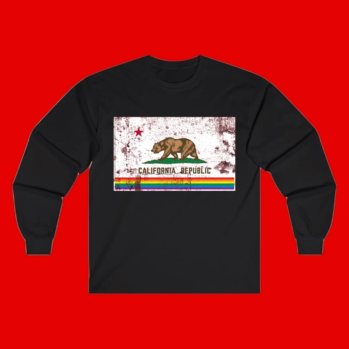 Distressed vintage California Republic flag bear with raised paw on green grass, red star above, CALIFORNIA REPUBLIC text, and rainbow pride stripes below