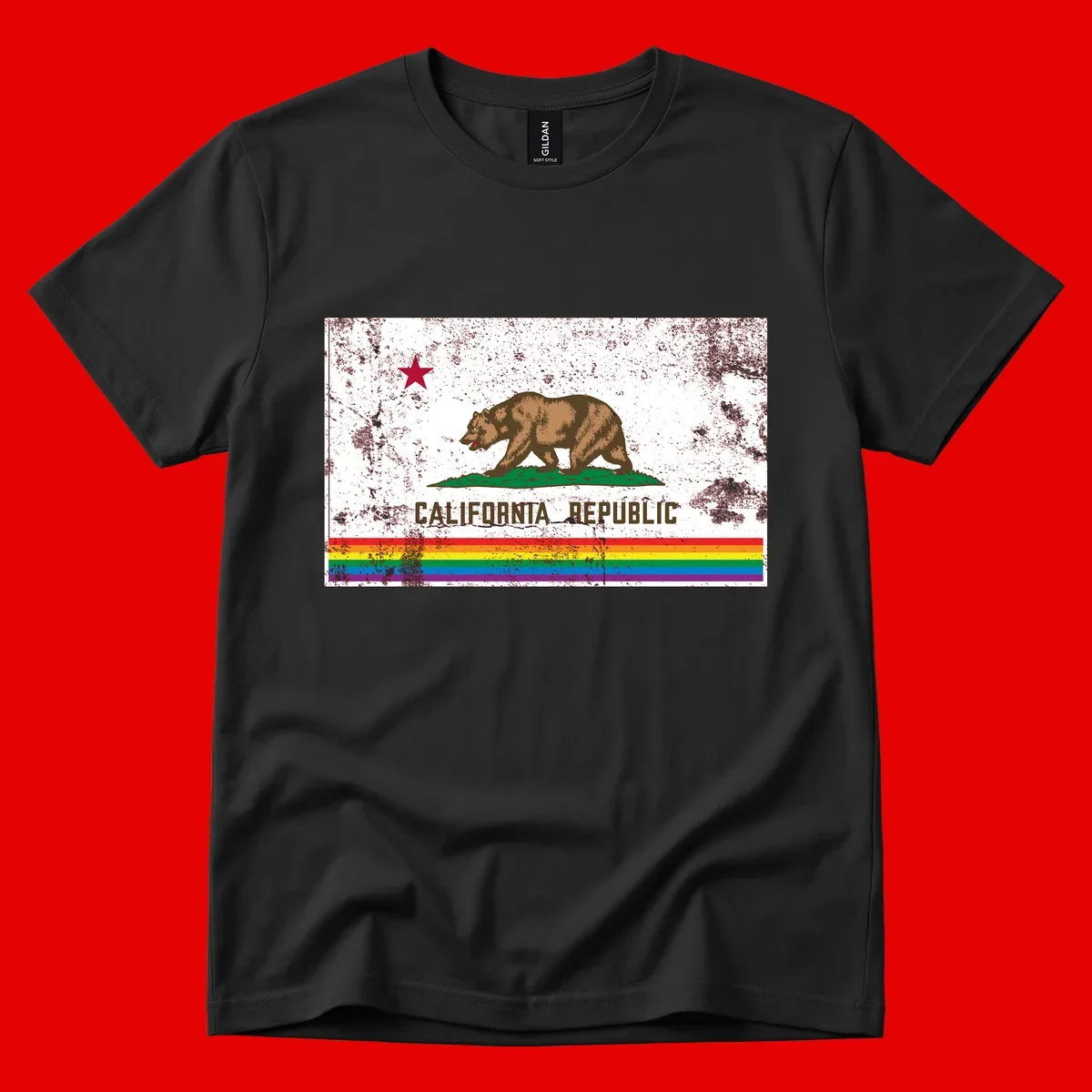 Distressed vintage California Republic flag bear with raised paw on green grass, red star above, CALIFORNIA REPUBLIC text, and rainbow pride stripes below