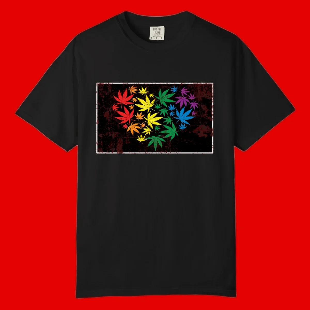 Rainbow cannabis leaves in red, orange, yellow, green, blue, and purple arranged on distressed black background