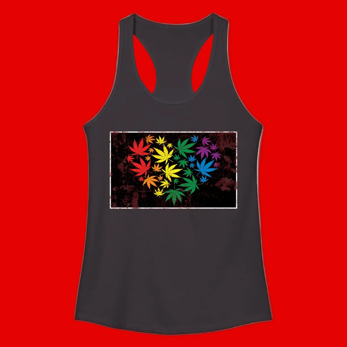 Rainbow cannabis leaves in red, orange, yellow, green, blue, and purple arranged on distressed black background