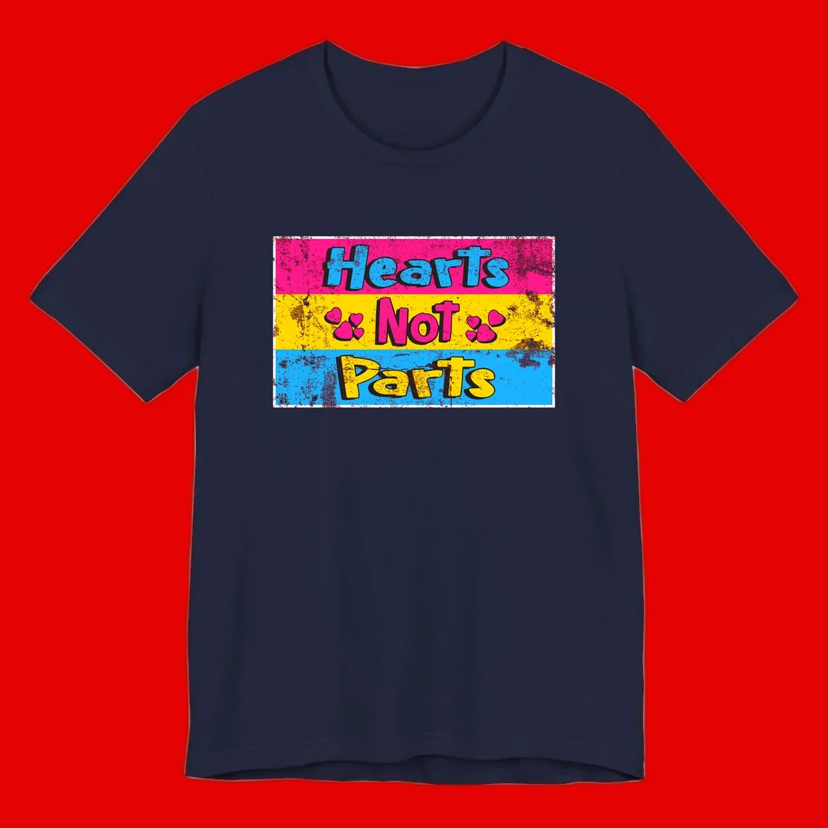 Hearts Not Parts design: magenta, yellow, and blue color-blocked graphic with distressed typography and pink hearts celebrating trans and non-binary identity