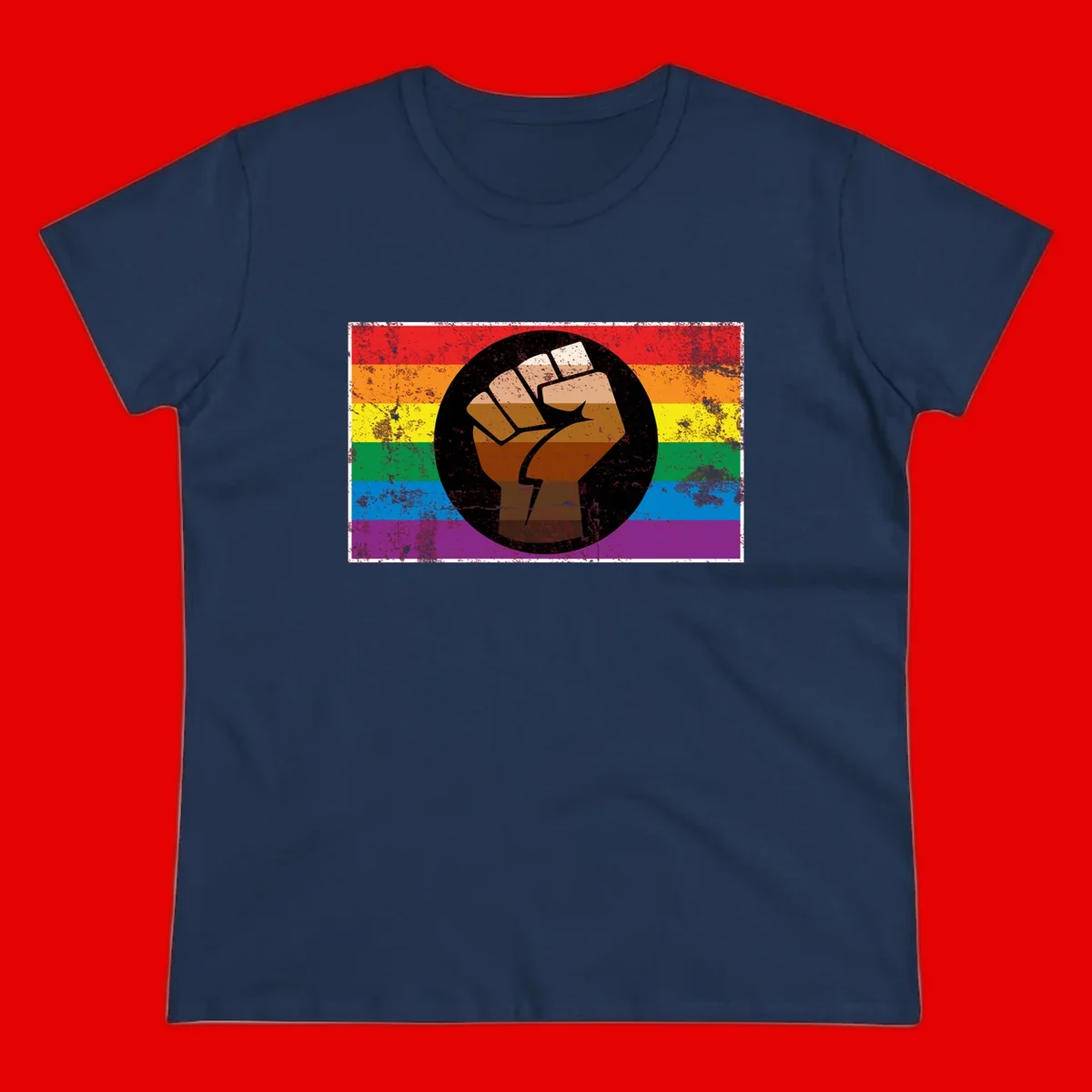 Distressed circular badge featuring a raised brown fist overlaid on a rainbow pride flag background, symbolizing LGBTQ+ solidarity and empowerment