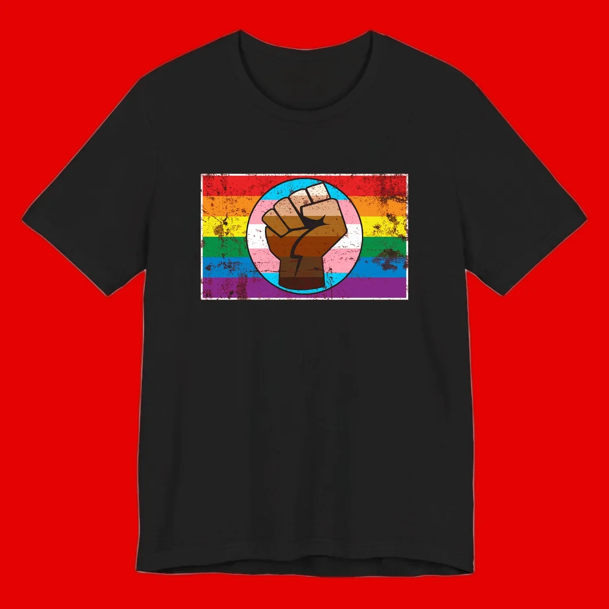 Raised brown fist in circular badge with rainbow pride flag and trans flag stripe background symbolizing LGBTQ+ solidarity