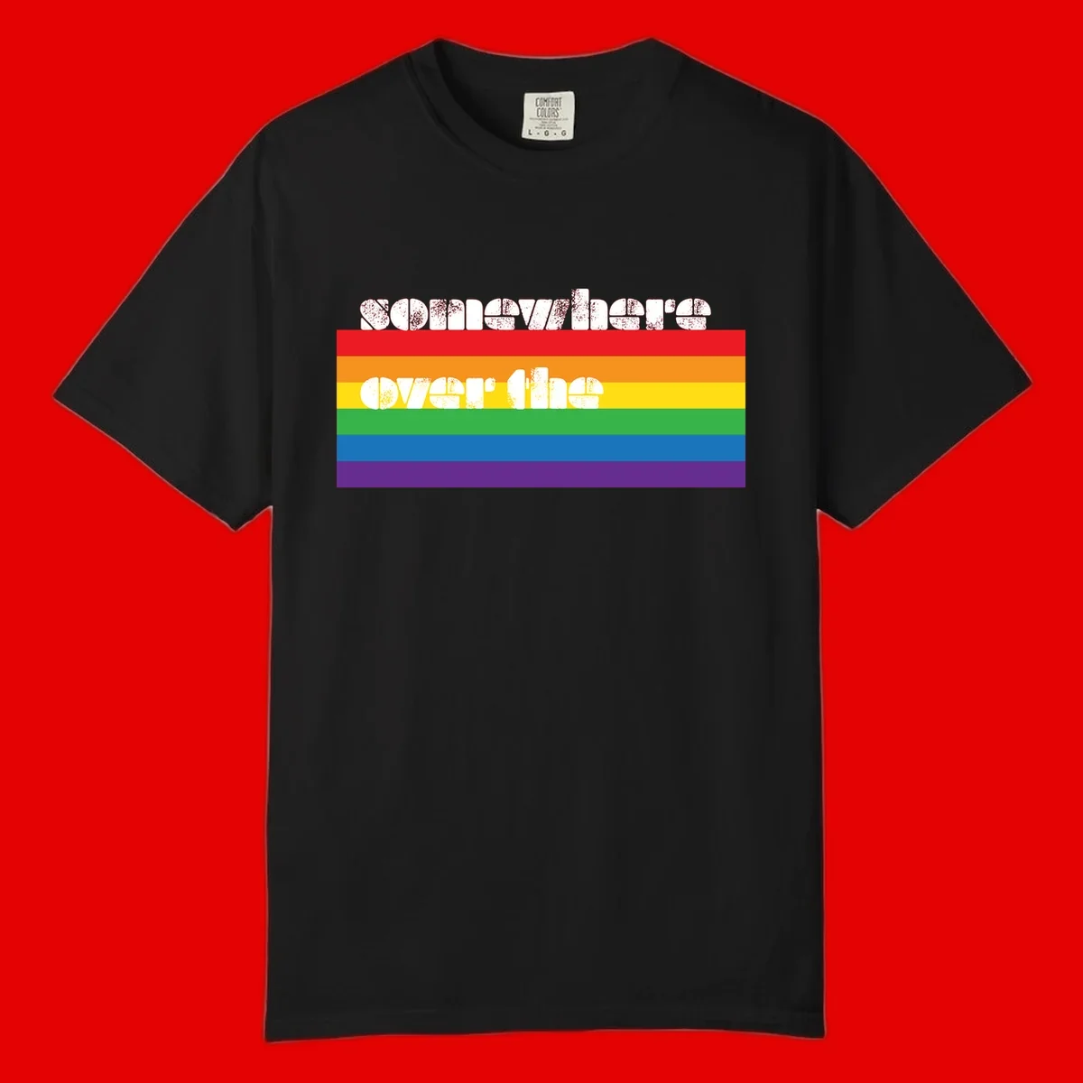 Somewhere over the rainbow pride design with white distressed text over six-color horizontal pride flag stripes