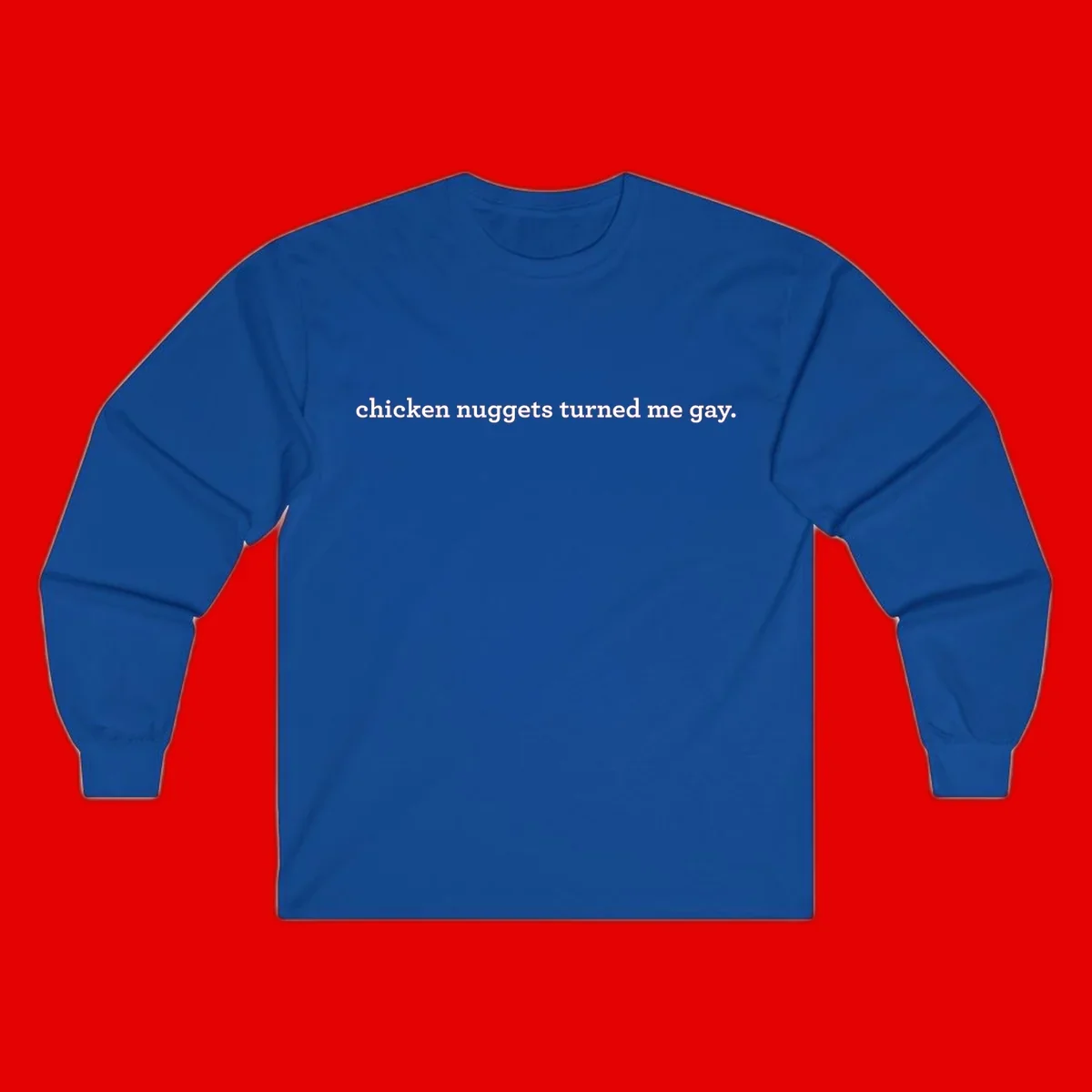 White text reading 'chicken nuggets turned me gay' on gray background - humorous pride design