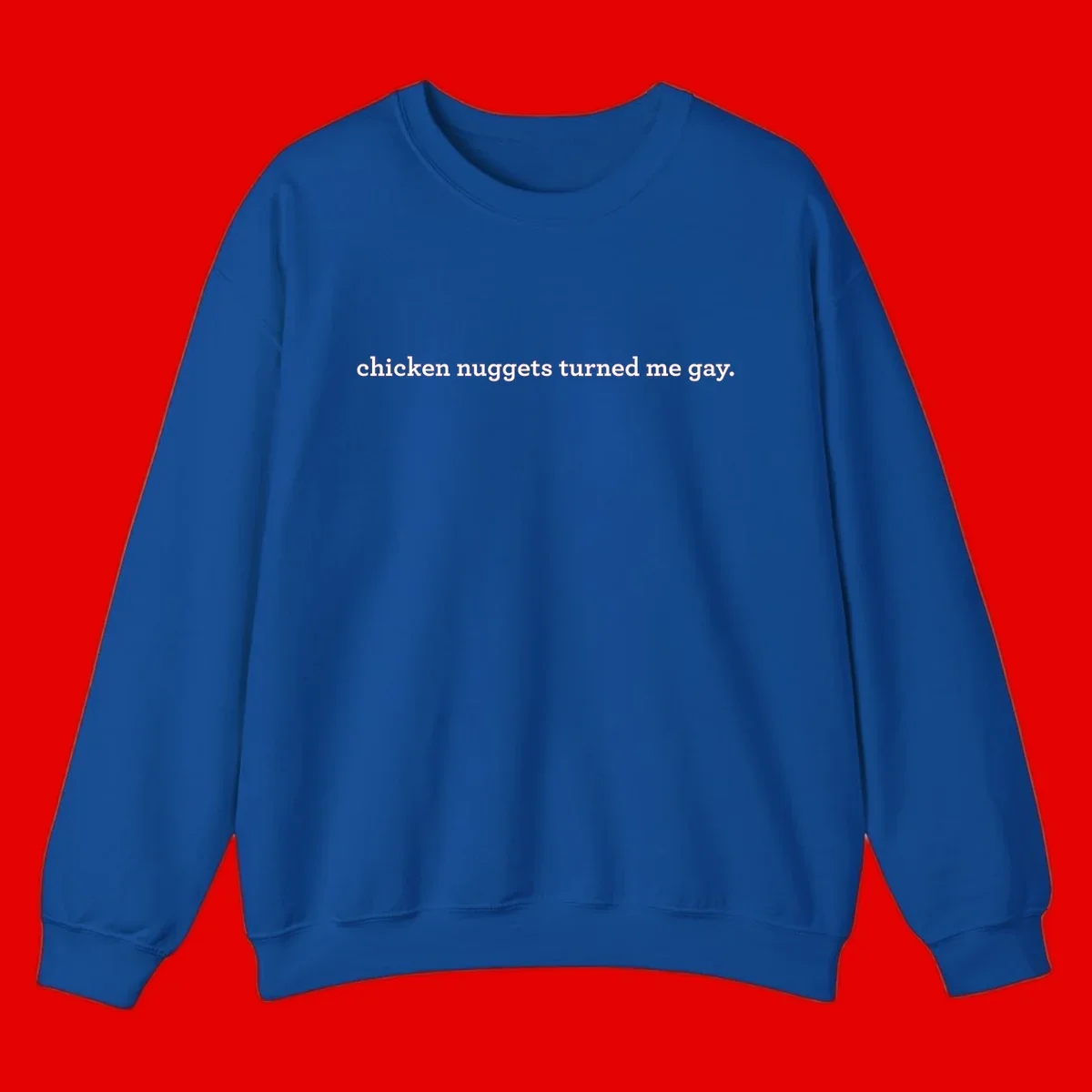 White text reading 'chicken nuggets turned me gay' on gray background - humorous pride design