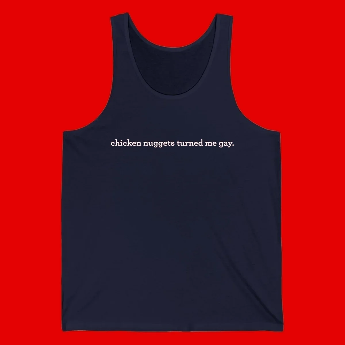 White text reading 'chicken nuggets turned me gay' on gray background - humorous pride design