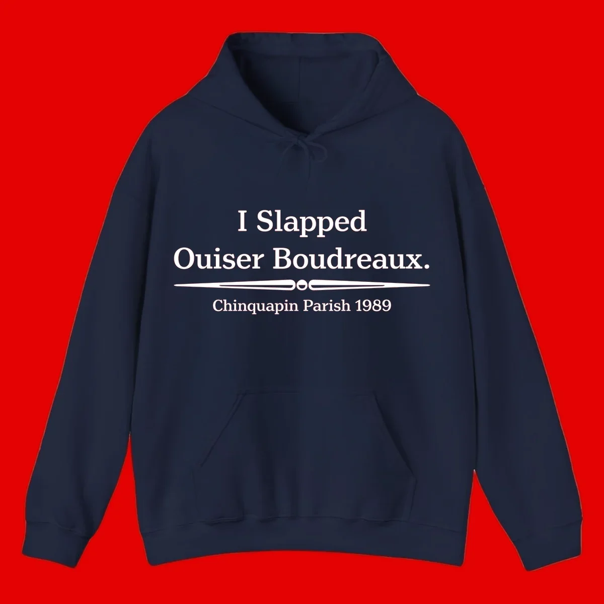 White text on gray background reading 'I Slapped Ouiser Boudreaux. Chinquapin Parish 1989' with decorative line divider