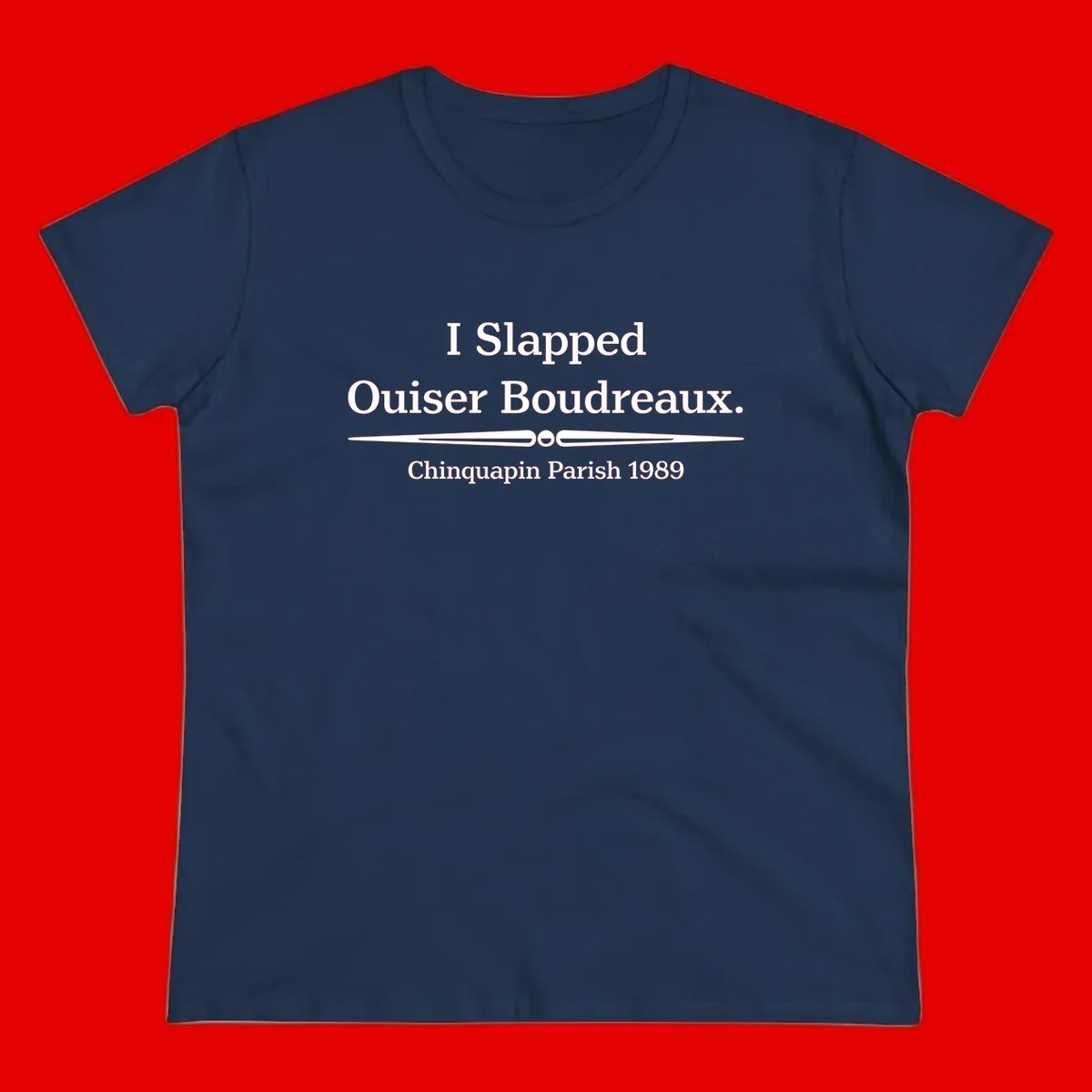 White text on gray background reading 'I Slapped Ouiser Boudreaux. Chinquapin Parish 1989' with decorative line divider