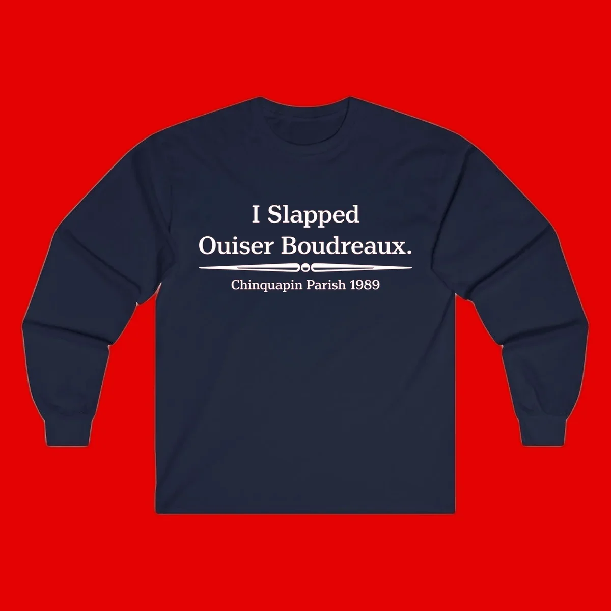 White text on gray background reading 'I Slapped Ouiser Boudreaux. Chinquapin Parish 1989' with decorative line divider